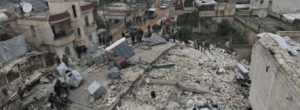 Aerial shot of debris from earthquakes in Northern Syria. Earthquake safety information is important for helping communities recover.