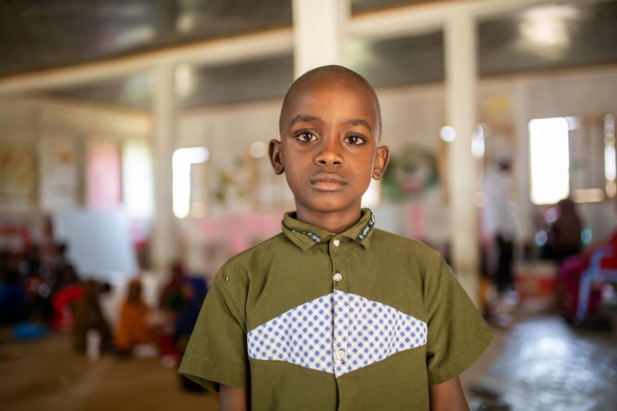 A portrait of Omar, 7, at the Child-Friendly Space he loves to attend