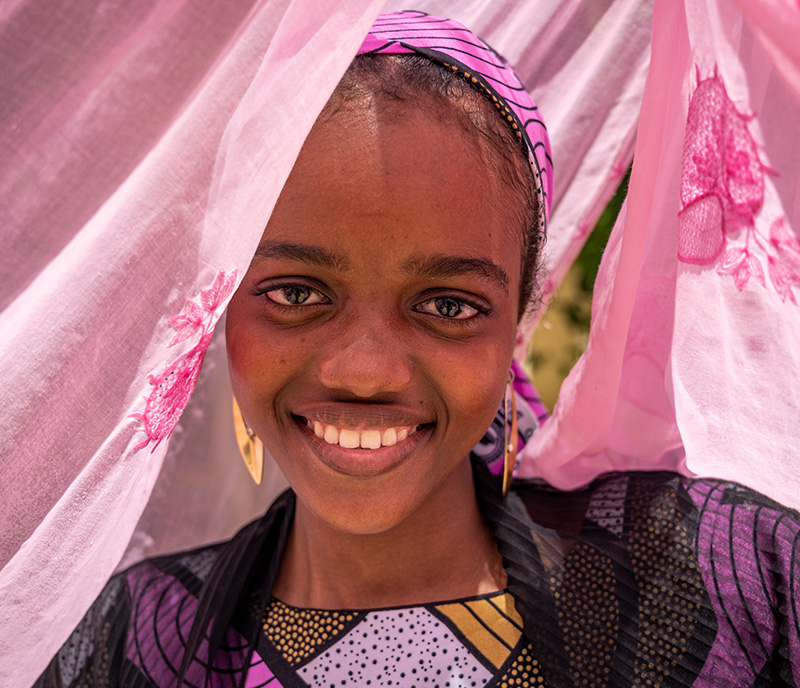 A portrait of Victory, 13, in a refugee settlement in Cross River State, Nigeria_