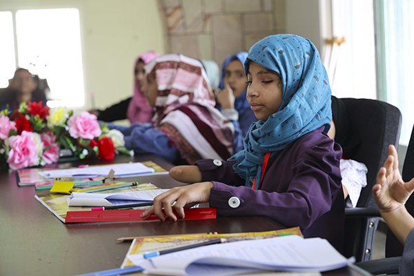 Maha, 10, attending a workshop for injured children organised by Save the Children